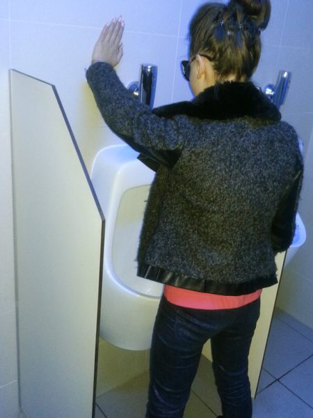 Woman-with-Pibella-Pinkelhilfe-Pibella-Female-UrinationDevice-used-on-man-toilet